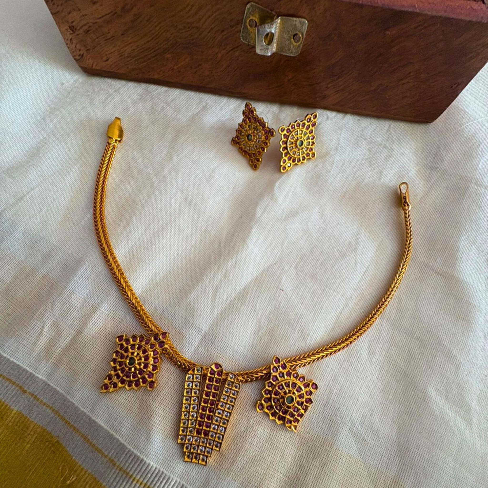 Antique gold finish Balaji temple necklace with ruby kemp stones and matching square studs